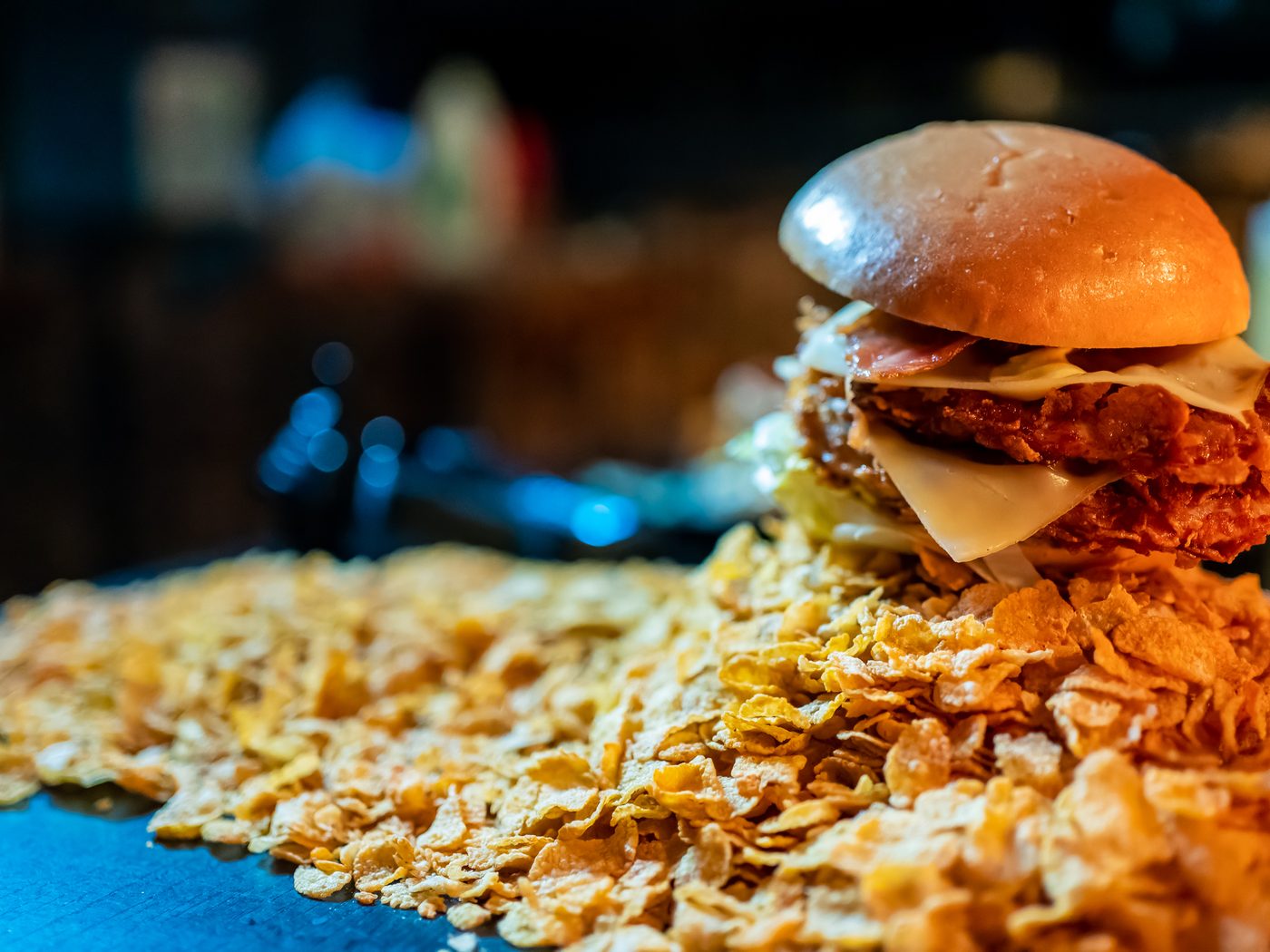 Burger crujiente sobre patatas Can Xam&Pa